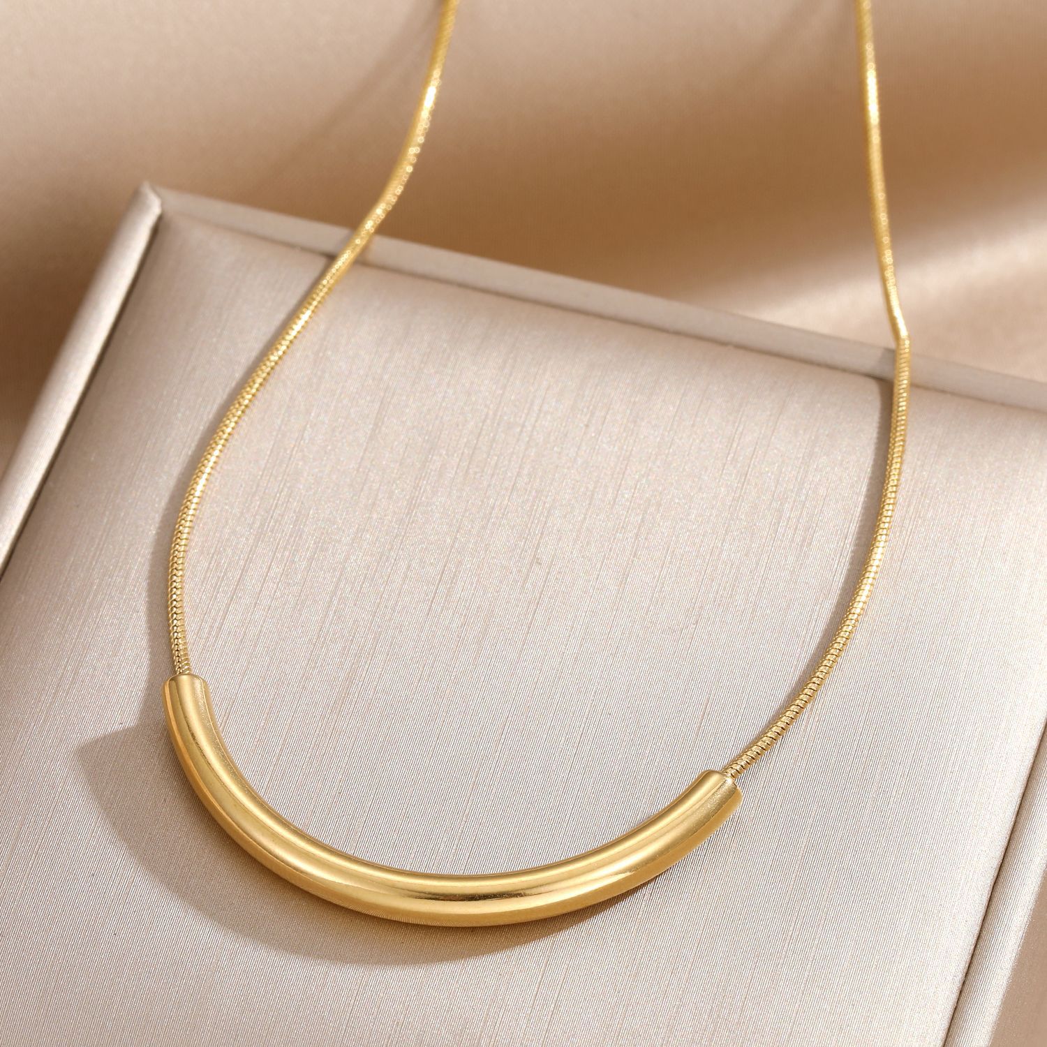 SNKL07 - Curved Tube Stainless Steel Necklace
