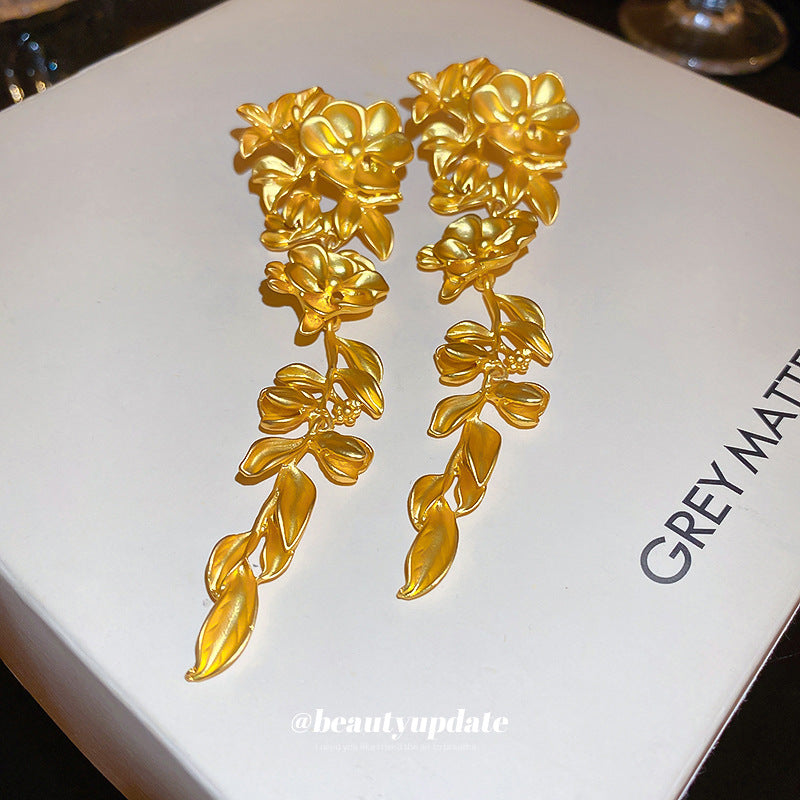 Golden Color Flower Tassel Earrings