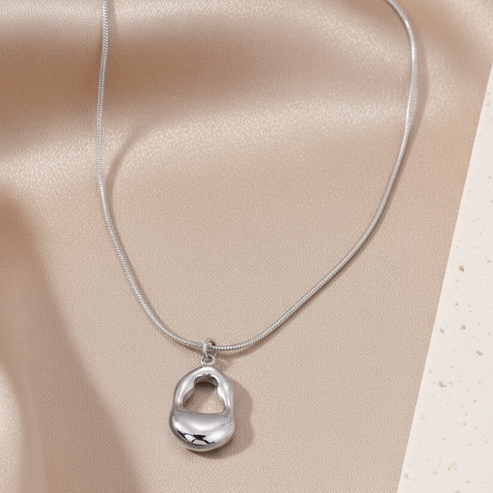 SNKL01 - Hollowed-out Teardrop Stainless Steel Necklace