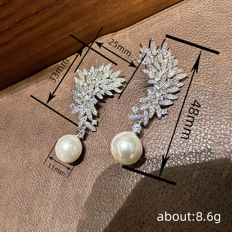 ZER20 - Imitation Pearl Inlaid Zirconia Earrings
