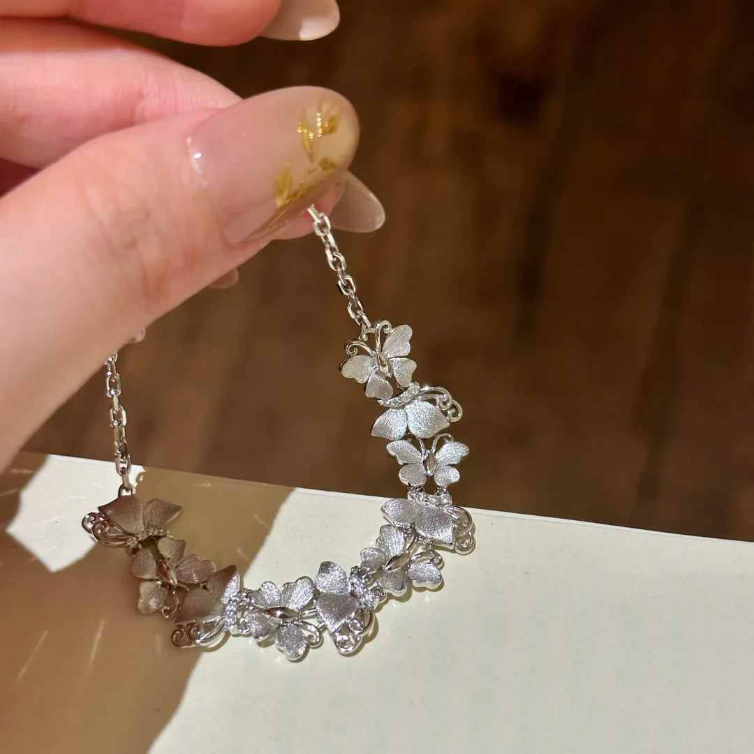 SBRAL16 - White Gold Butterfly Bracelet