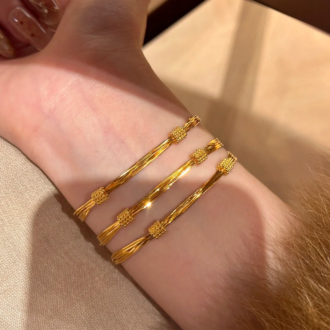 SBRAL17 - Gold Multi-Layered Snake Bone Bracelet