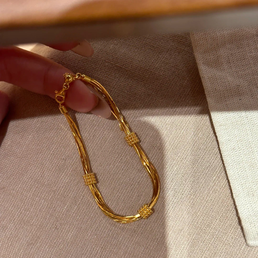 SBRAL17 - Gold Multi-Layered Snake Bone Bracelet