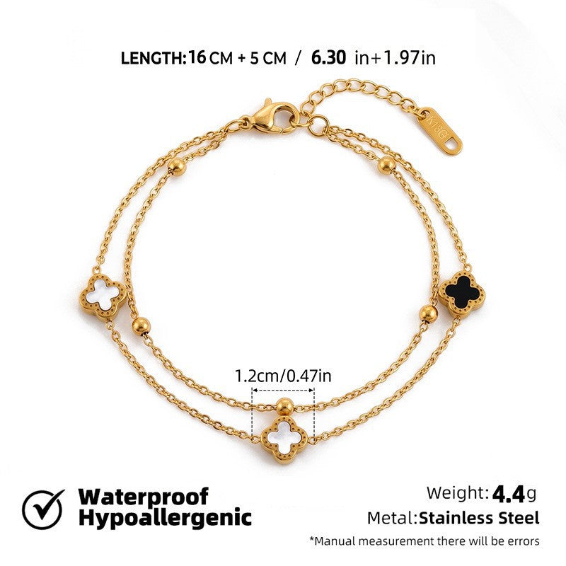 SBRAL35 - Double-Sided Black and White Four Leaf Clover Bracelet