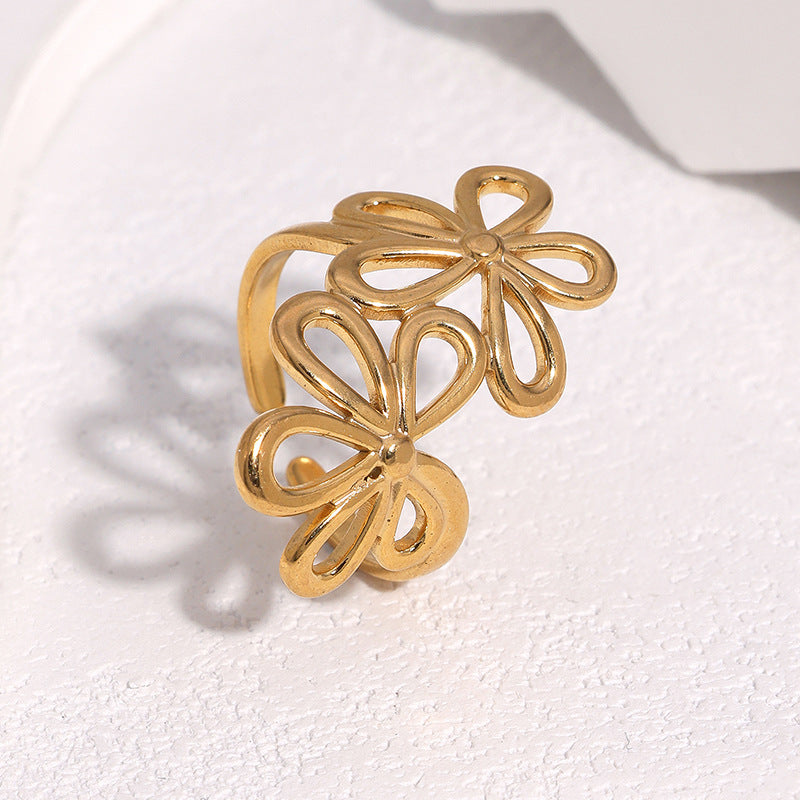 SRNG-76 - Stainless Steel Open Ring with a Floral Design