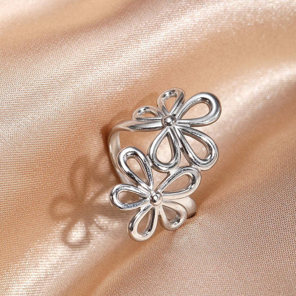 SRNG-76 - Stainless Steel Open Ring with a Floral Design