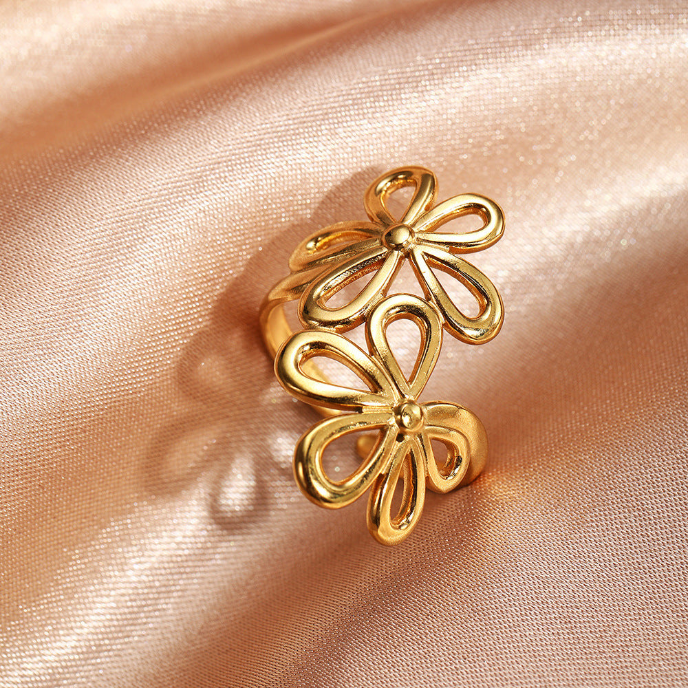 SRNG-76 - Stainless Steel Open Ring with a Floral Design