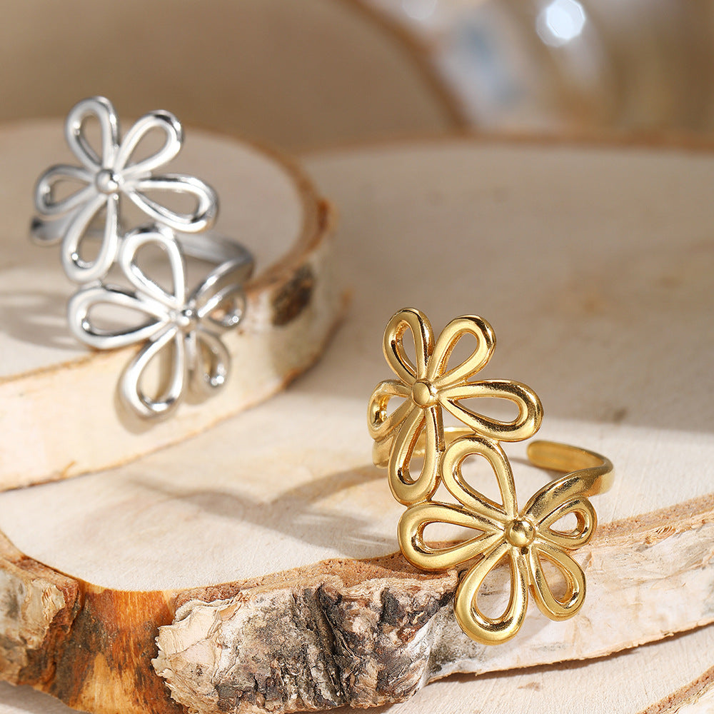 SRNG-76 - Stainless Steel Open Ring with a Floral Design