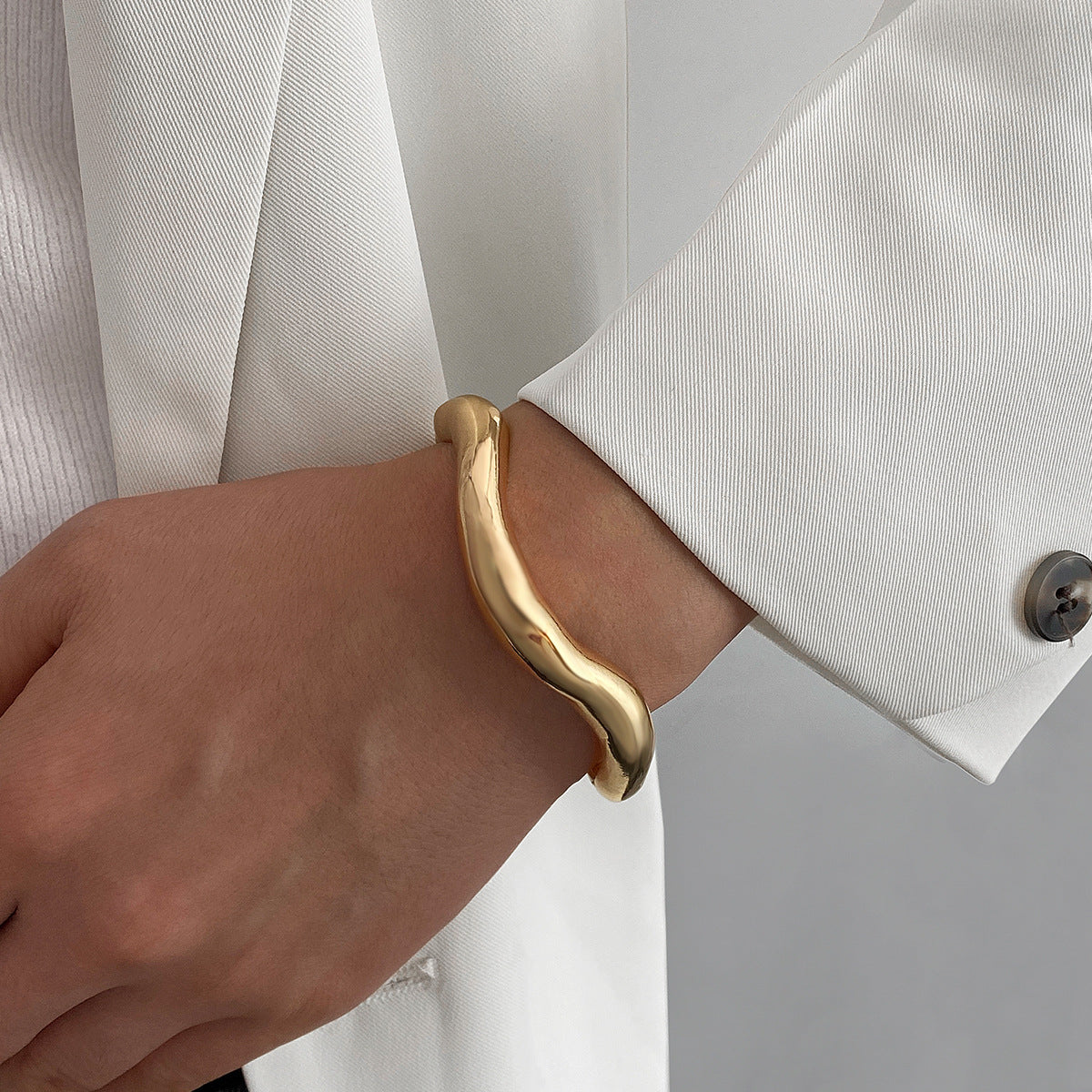 Wave Design Gold-Tone Bangle | Zi Collection Hub