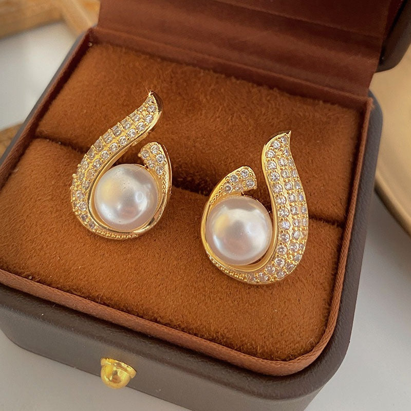 S925 Silver Needle Flame Pearl Earrings